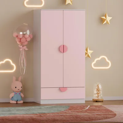 A child's bedroom with a pink wardrobe, decorations, and a toy.
