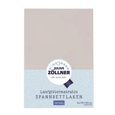 A product shot of a baby crib mattress cover.