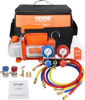 A vacuum pump kit with a carrying bag, gauges, hoses, and oil.