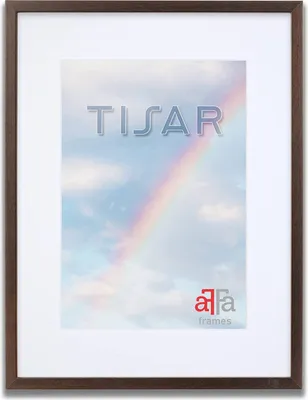 A framed picture with a rainbow and clouds.