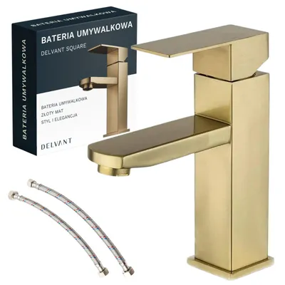A gold-colored faucet and its packaging are displayed against a white background, with two flexible hoses in the foreground.