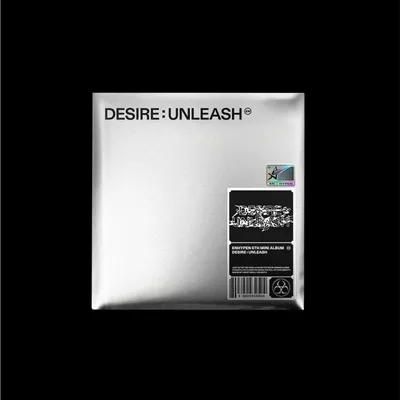 A silver album cover with black text and a sticker.