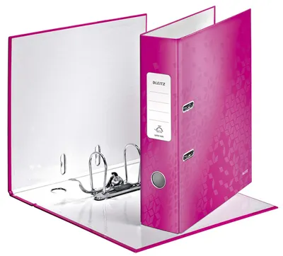 A pink lever arch file is shown open, displaying its interior and the metal rings for holding papers. The file has a patterned exterior.