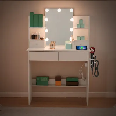 A white vanity table with a lighted mirror, drawers, and shelves, displaying various makeup and beauty products.