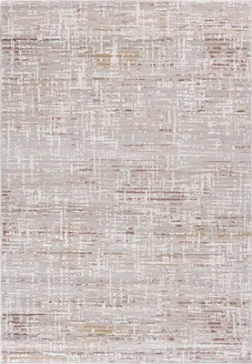 A close-up, top-down view of a rug with an abstract pattern.