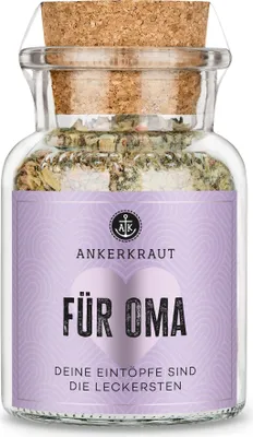 A glass jar filled with herbs and spices, sealed with a cork, and featuring a purple label with text and a heart graphic.
