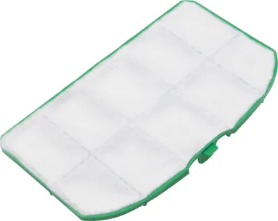 A close-up view of a green-edged white filter with a grid pattern on top, isolated on a white background.