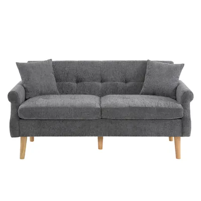 A studio shot of a gray sofa.