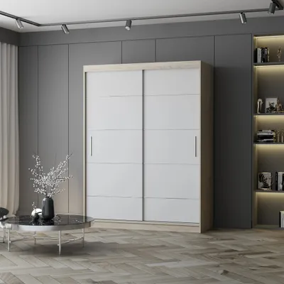 A modern bedroom or living room with a large sliding door wardrobe, a coffee table, and a bookshelf.