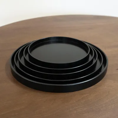 Immagine prodotto di QUVIO Vassoio rotondo in legno - Nero - 36 cm
