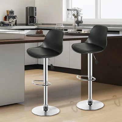 Two black bar stools are shown in a kitchen setting.