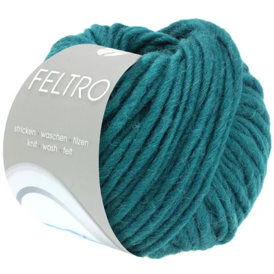 A ball of teal yarn with a label.