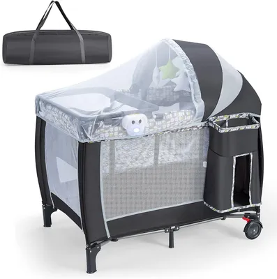 Produktbild von Faltbares Reisebett mit Rollen für Babys, Kinderbett mit Wickelauflage und Matratze, Spielbogen und Spieluhr, inklusive Tragtasche und abnehmbarem Mückennetz, bis 15 kg