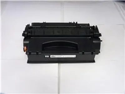 A black toner cartridge is shown on a white background.