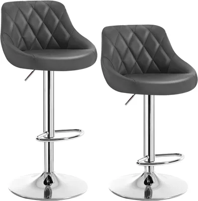 Two gray bar stools are shown against a white background.