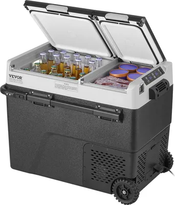 A portable car refrigerator with its lid open, showing bottles of drinks and food inside.