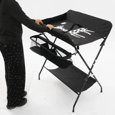 Immagine prodotto di Fasciatoio per neonati - Fasciatoio indipendente - Pieghevole - Per bambini da 0 a 12 mesi - Portata massima 15 kg - Cintura di sicurezza - Vano portaoggetti - Nero