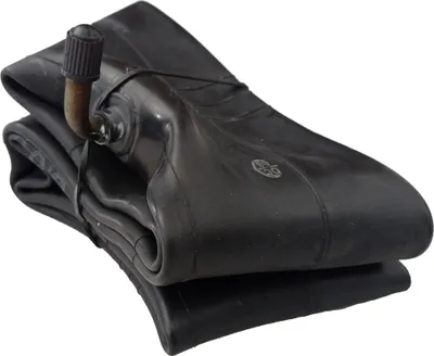 A folded black rubber inner tube with a metal valve stem.