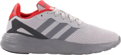 A side view of a single Adidas sports shoe.