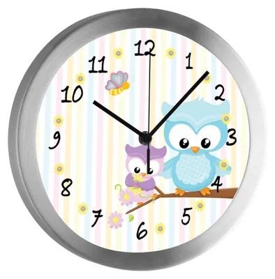 A round wall clock with a cartoon owl design.