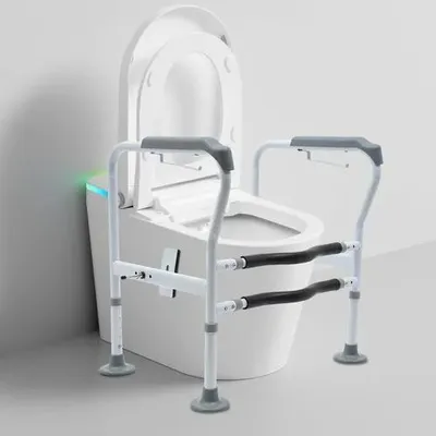 Produktbild von Toilettensicherheitsrahmen - Stützgestell mit Griffen - Höhenverstellbar 65–78 cm - Breite 60–65 cm - Tragkraft 150 kg - Kohlenstahl + PolyurethanSchaum - Weiß