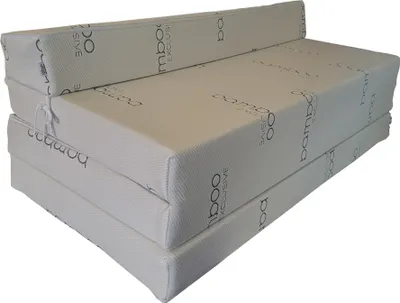 A folded mattress is shown against a white background.