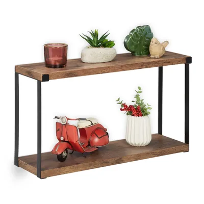 A two-tiered industrial-style shelf with decorative items on it.