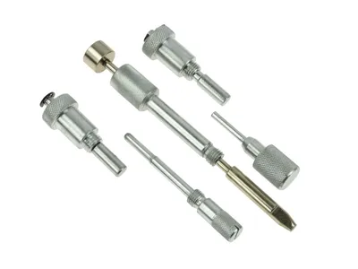 A set of metal automotive tools arranged on a white background.