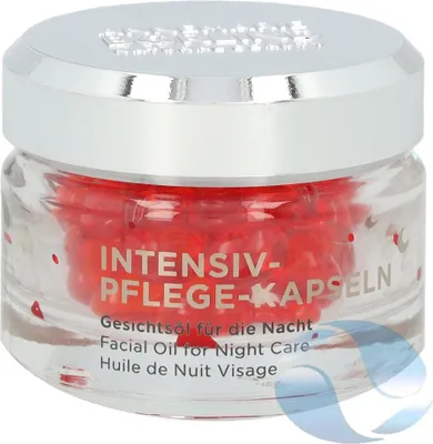 A clear, well-lit studio shot of a cosmetic product in a glass jar.