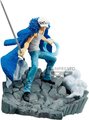 A collectible figurine of Trafalgar Law from One Piece, standing on a rocky base.