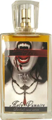 A bottle of perfume with a label featuring a vampire's mouth and fangs.