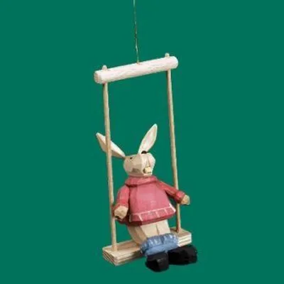 Produktbild von Osterdekoration Osterhasenkind auf Schaukel geschnitzt Höhe 10cm NEU