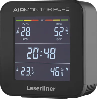 A black digital air quality monitor displaying PM2.5, PM10, time, temperature, and humidity.