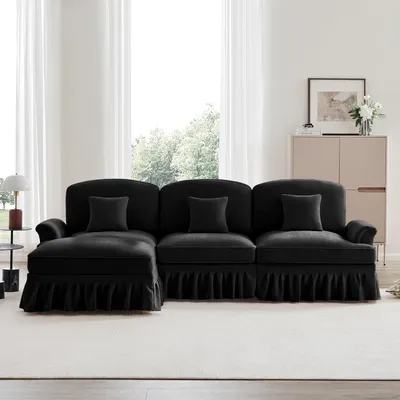 Produktbild von Modulares Mid-Century L-förmiges 3-Sitzer Sofa aus Chenille mit Trichter-Armlehnen, abnehmbarer Rüschenschürze, spindelförmigen Beinen & beweglichem Hocker – Tiefer Sitzkomfort fürs Wohnzimmer,Schwarz