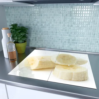 Produktbild von Spritzschutz Herdabdeckplatte Schneidebrett aus Glas Bananenscheiben 2-Teilig (60x52cm)
