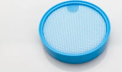 A blue and white circular filter on a white background.