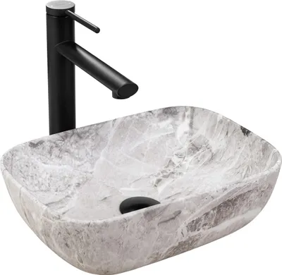 A bathroom sink and faucet.