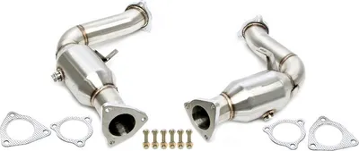 Two stainless steel exhaust downpipes with catalytic converters and gaskets, presented on a white background.