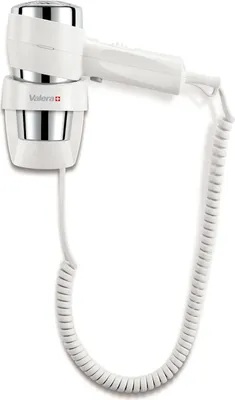 A white wall-mounted hairdryer with a coiled cord.