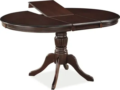 A dark brown, oval-shaped dining table with a pedestal base and a leaf extended in the center.