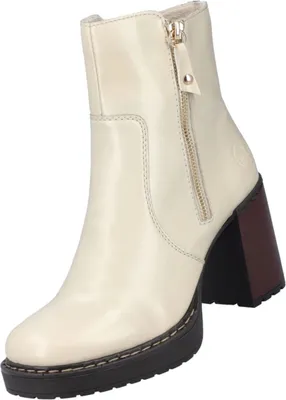 A single beige ankle boot with a platform and block heel is shown against a white background.