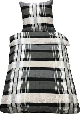 A plaid patterned duvet cover and pillowcase set.