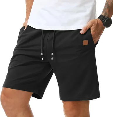 Produktbild von Schwarze Herrenshorts aus Baumwolle und Polyester mit elastischem Bund und Reißverschlusstaschen