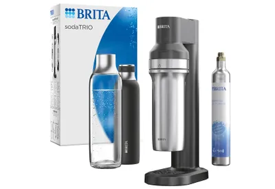 A Brita sodaTRIO water carbonator set is displayed against a white background, including the carbonator machine, two bottles, a CO2 cylinder, and the product packaging.