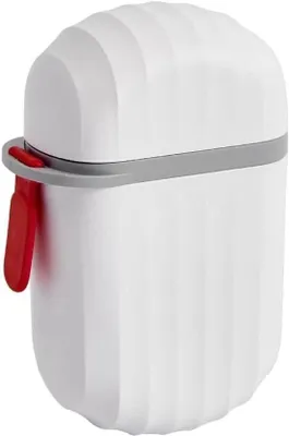Image de Distributeur de savon vert avec écoulement pour la salle de bain