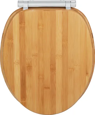 A top-down view of a wooden toilet seat.