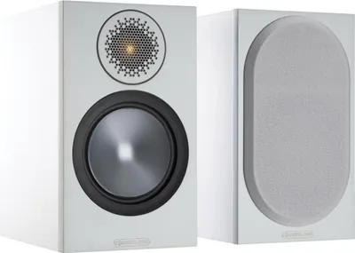 A pair of white Monitor Audio Bronze 50 6G compact speakers are shown against a white background. The speaker on the left is shown from the front, displaying its tweeter and woofer. The speaker on the right is shown from the side, with its grille attached.