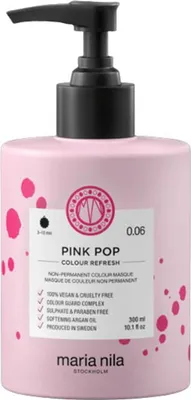 A pink bottle of Maria Nila Colour Refresh hair mask with a black pump dispenser.