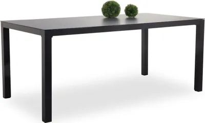 A black rectangular outdoor table with two green decorative spheres on top, set against a white background.