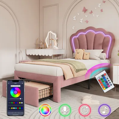 A child's bedroom with a pink bed and decorative elements.